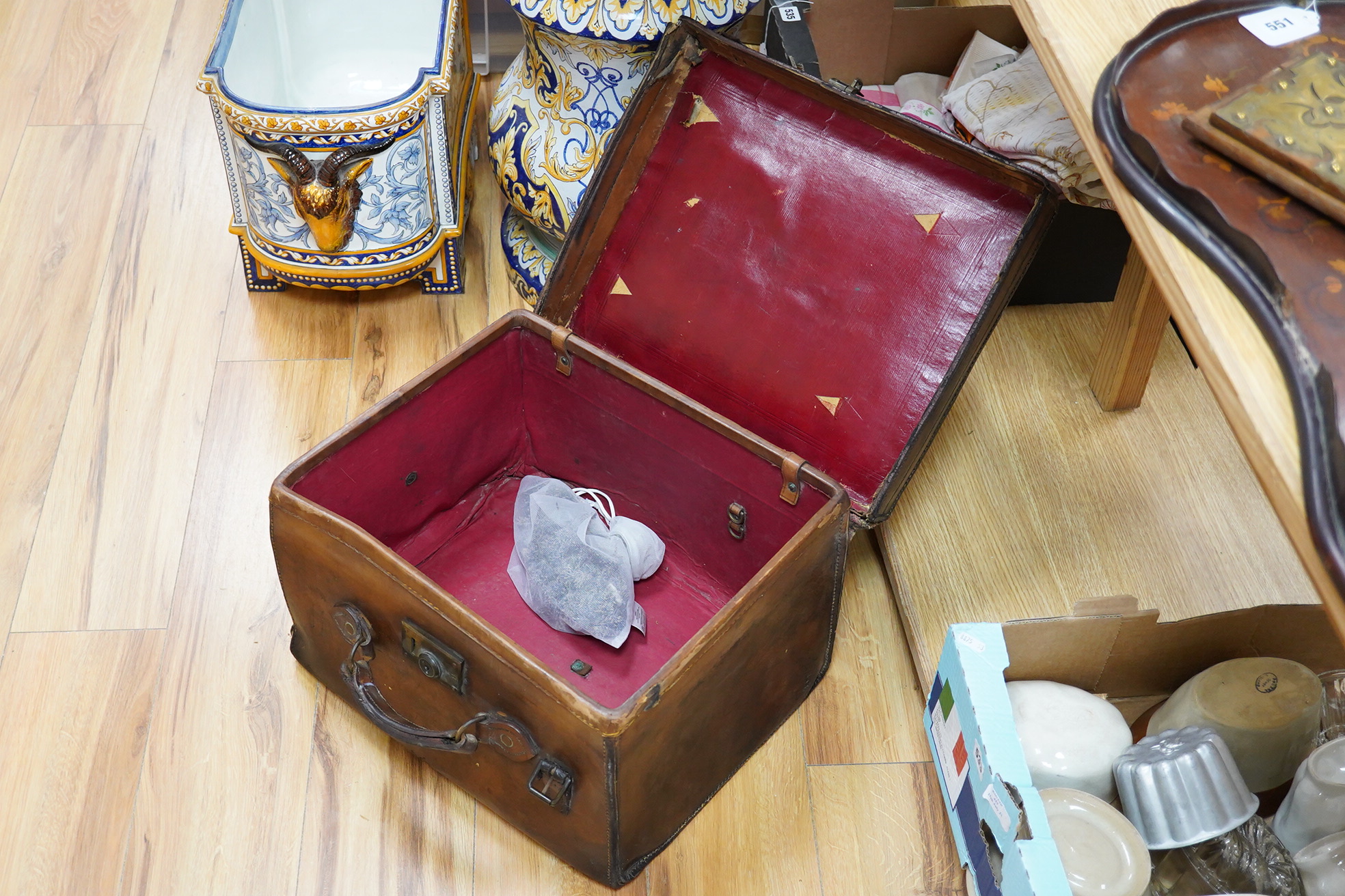 An early 20th century brown leather trunk